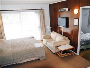 Sunset Lodge Motel Taupaki Экстерьер фото